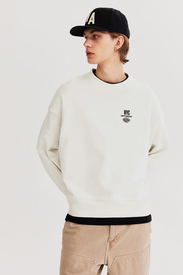 H&M Sweatshirt mit Print Relaxed Fit Weiß/NYC