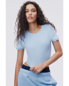 Croppad T-shirt Ljusblå
