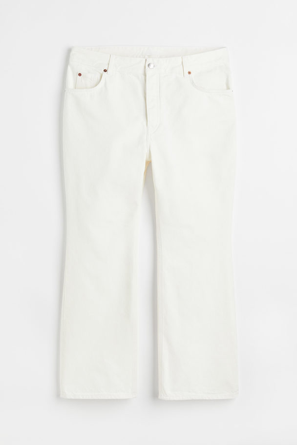 H&M H&amp;M+ Flared High Ankle Jeans Weiß