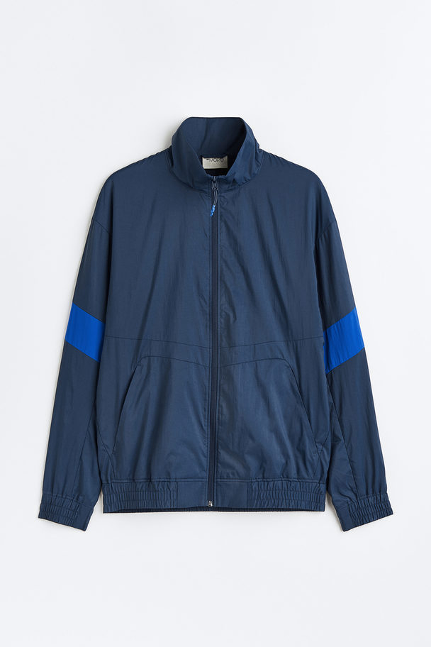 H&M Waterafstotend Trackjacket Donkerblauw/helderblauw