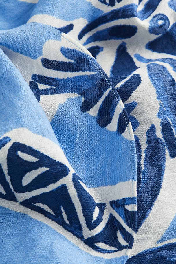 H&M Kleid mit V-Ausschnitt Hellblau/Palmen