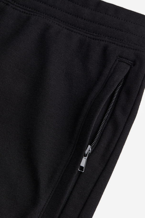 H&M COOLMAX® Shorts Schwarz