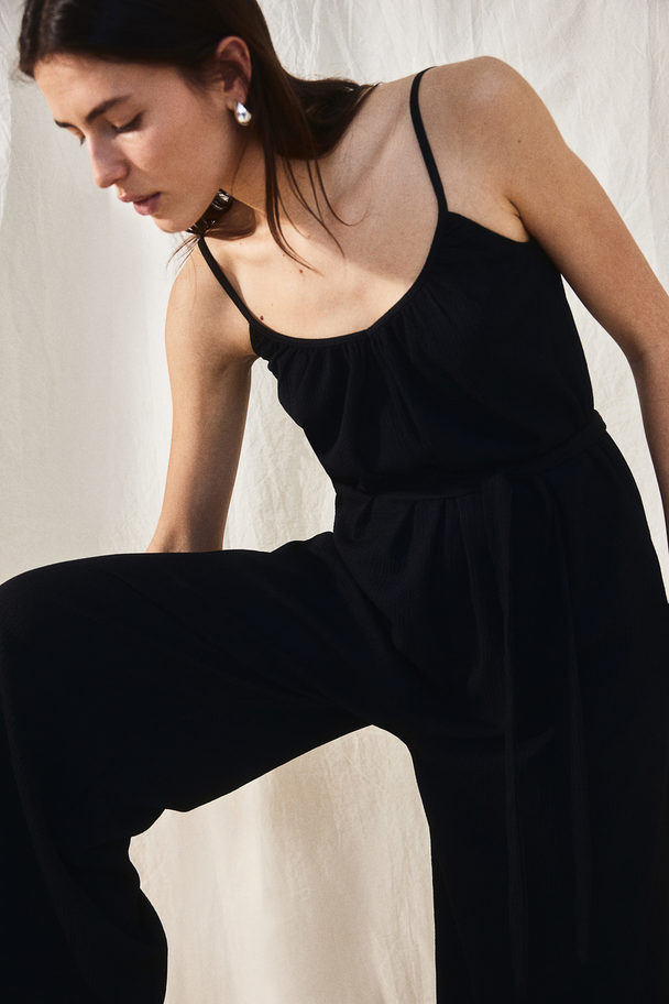 H&M Jumpsuit aus Jersey mit Bindegürtel Schwarz