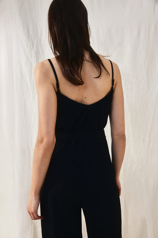 H&M Jumpsuit aus Jersey mit Bindegürtel Schwarz