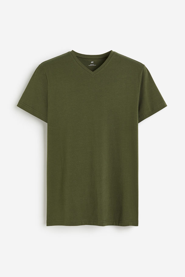 H&M T-Shirt mit V-Ausschnitt Slim Fit Dunkles Khakigrün