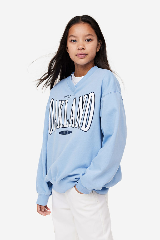H&M Oversized Sweatshirt Light Blue/oakland
