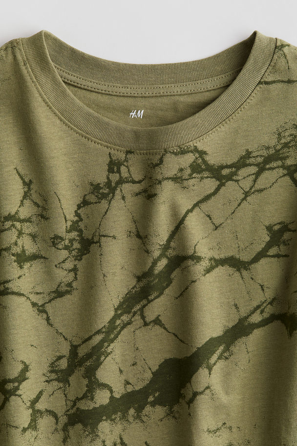 H&M T-Shirt mit Print Khakigrün/Batikmuster