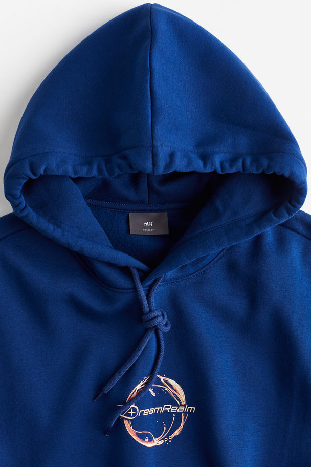 H&M Capuchonsweater Met Print - Loose Fit Blauw/dreamrealm