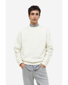 Sweatshirt mit Applikation Relaxed Fit Cremefarben