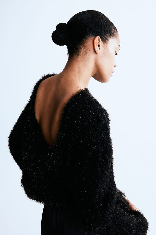 H&M Flauschiger Pullover mit tiefem Rückenausschnitt Schwarz