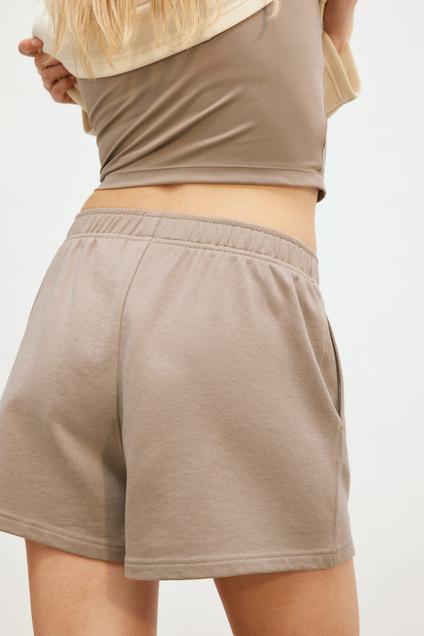 H&M DryMove™ Sportshorts Taupe