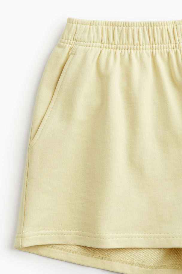 H&M Drymove™ Træningsshorts Lysegul