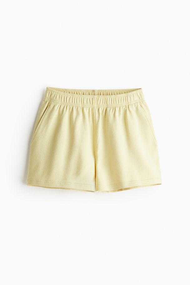 H&M Drymove™ Træningsshorts Lysegul