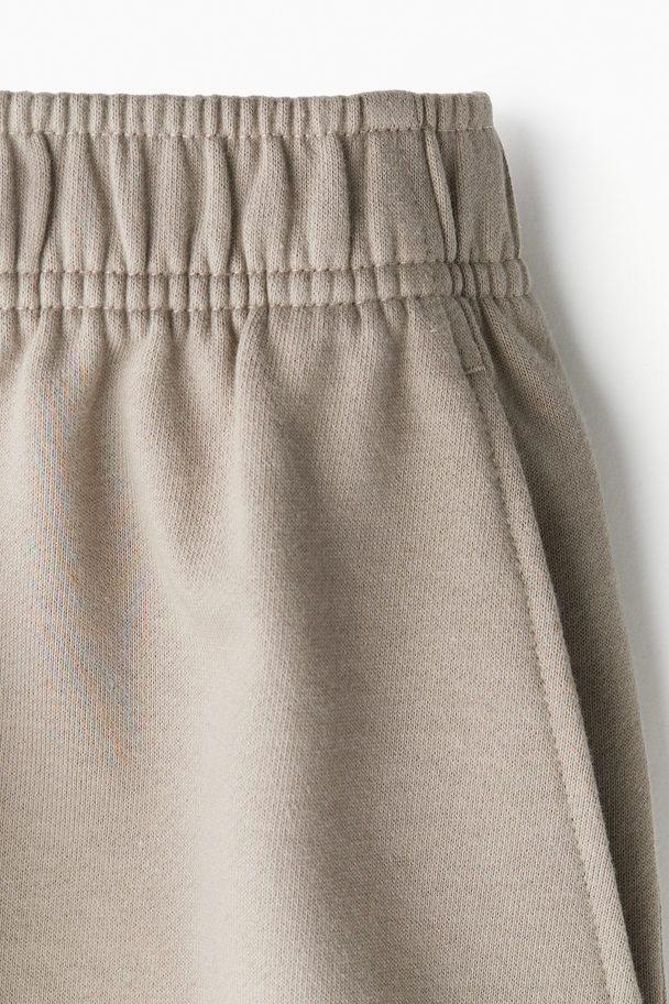 H&M DryMove™ Sportshorts Taupe