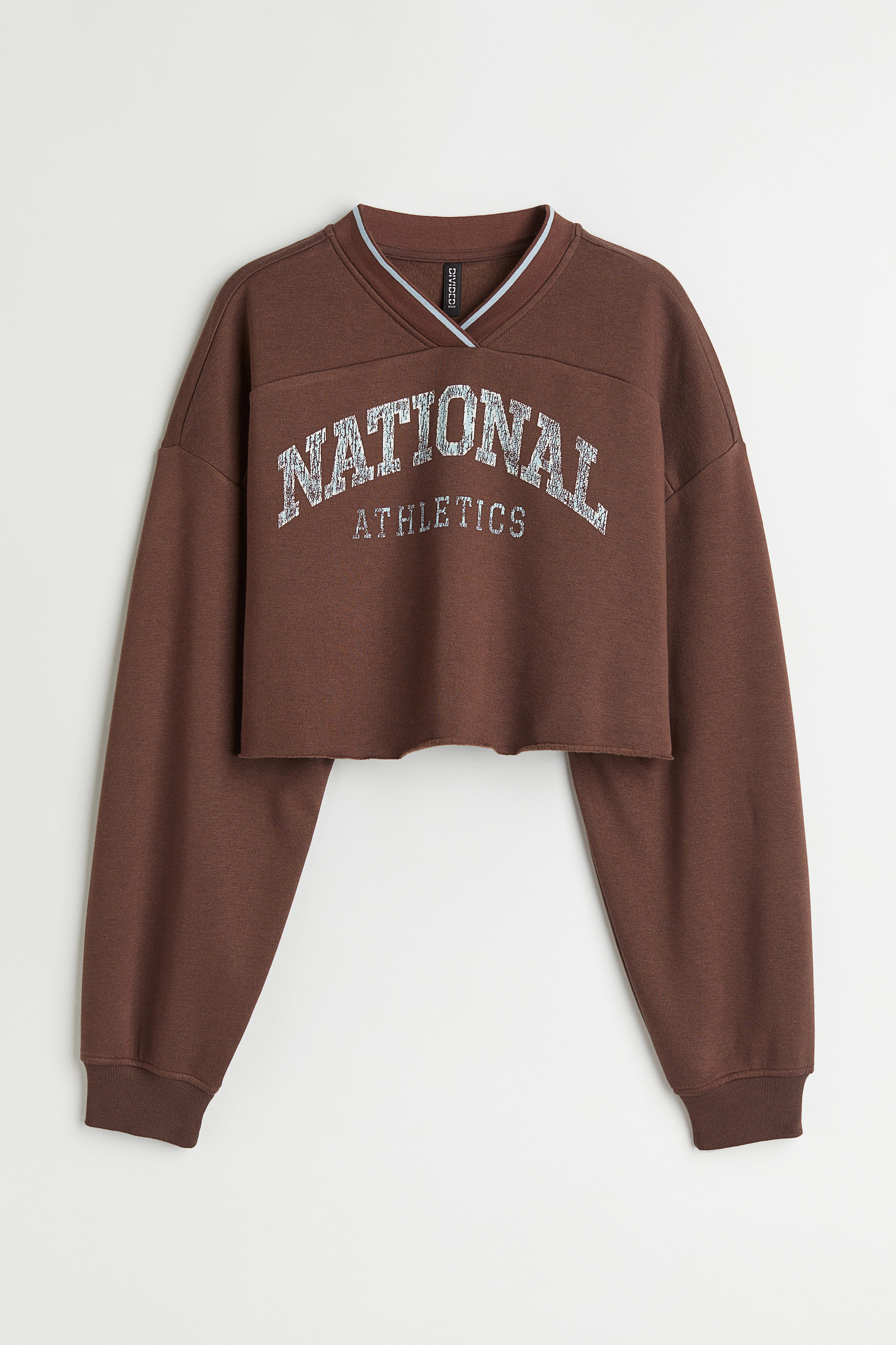 Billede af H&M Cropped Sweatshirt Mørkebrun/national Athletics, Hoodies & Sweatshirts. Farve: Dark brown/national athletics I størrelse M