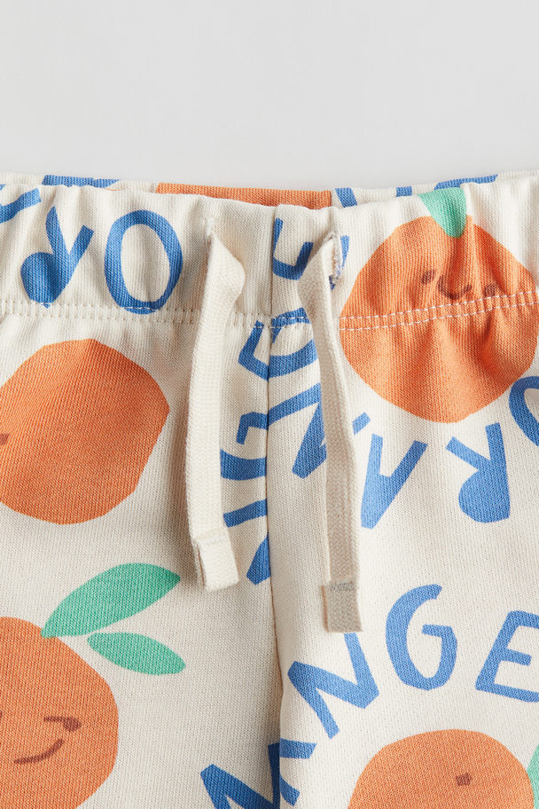 H&M Printed Sweatshorts Natural White/oranges