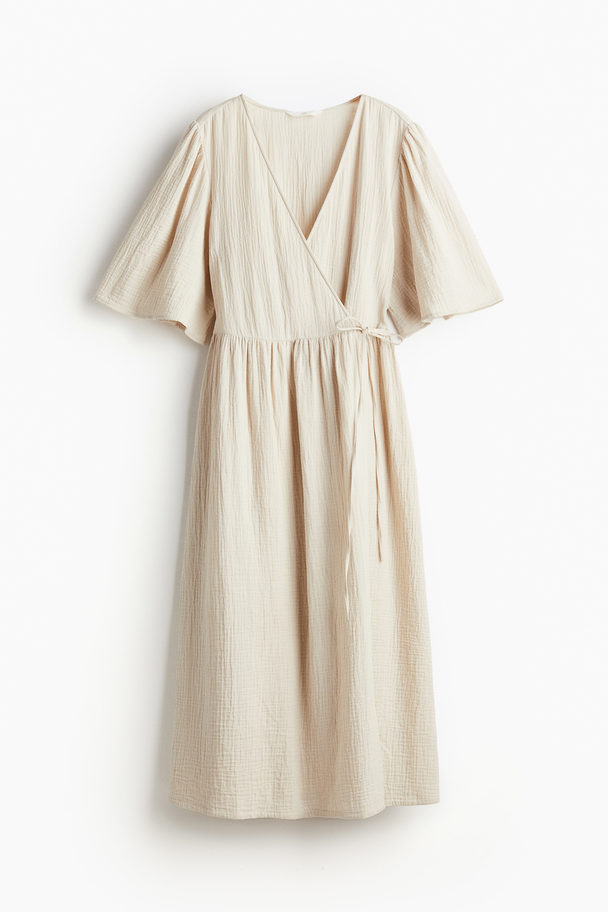 H&M Wickelkleid aus Musselin Hellbeige