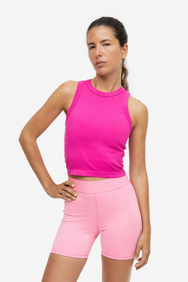 H&M DryMove™ Sport-Hotpants mit Meshdetail Bubblegum-Rosa