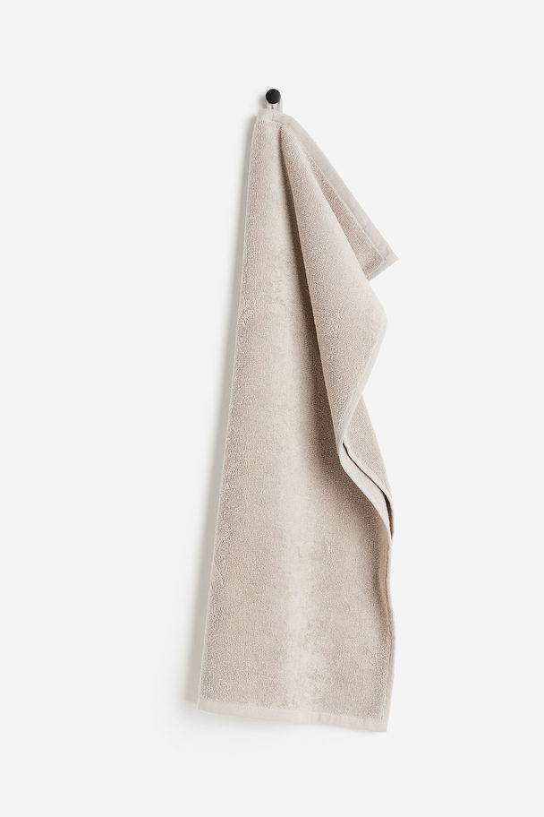 H&M HOME Handtuch aus Baumwollfrottee Helles Taupe