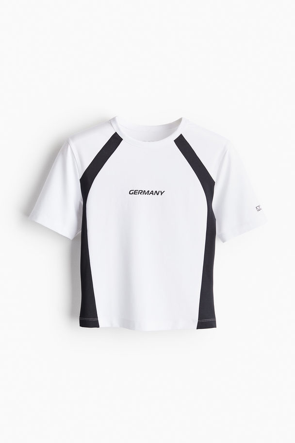 H&M DryMove™ Kurzes Sportshirt Weiß/Germany