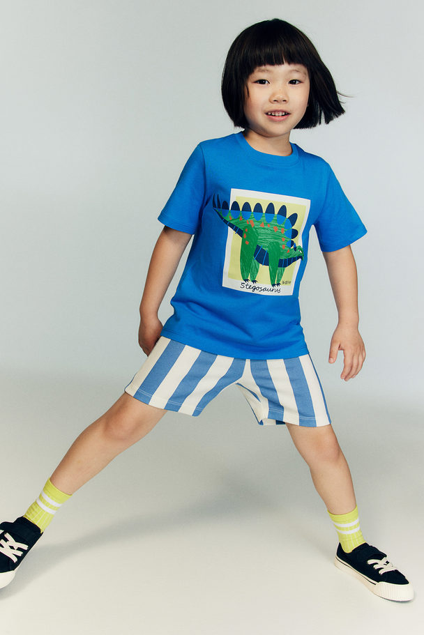 H&M T-Shirt mit Print Knallblau/Dinosaurier