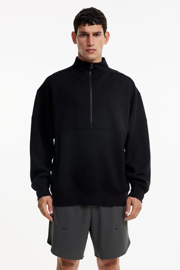 H&M DryMove™ Sweatshirt mit kurzem Zipper Schwarz