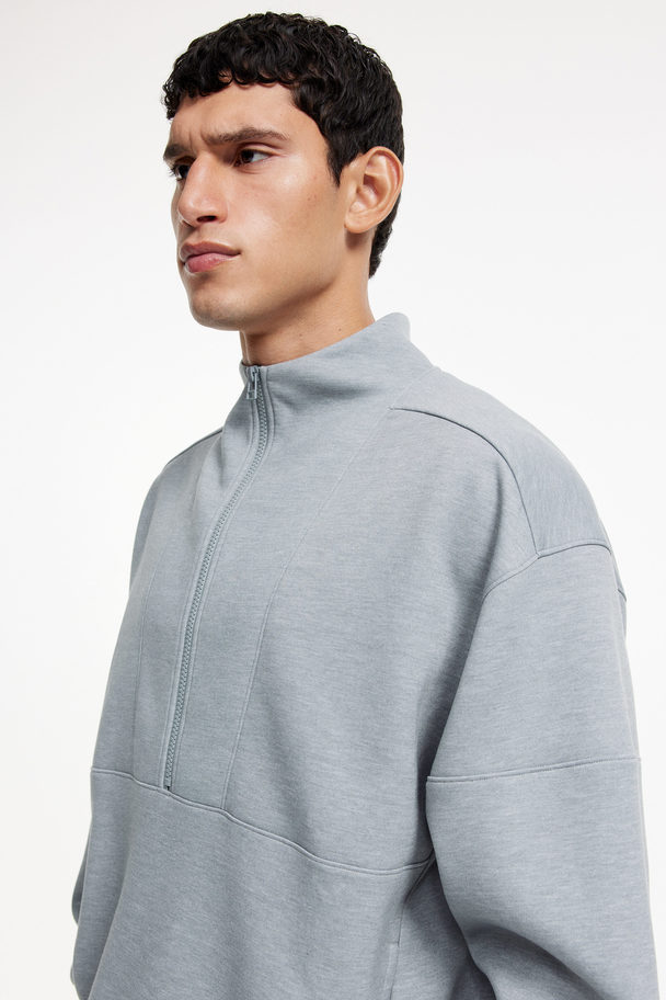 H&M DryMove™ Sweatshirt mit kurzem Zipper Graumeliert