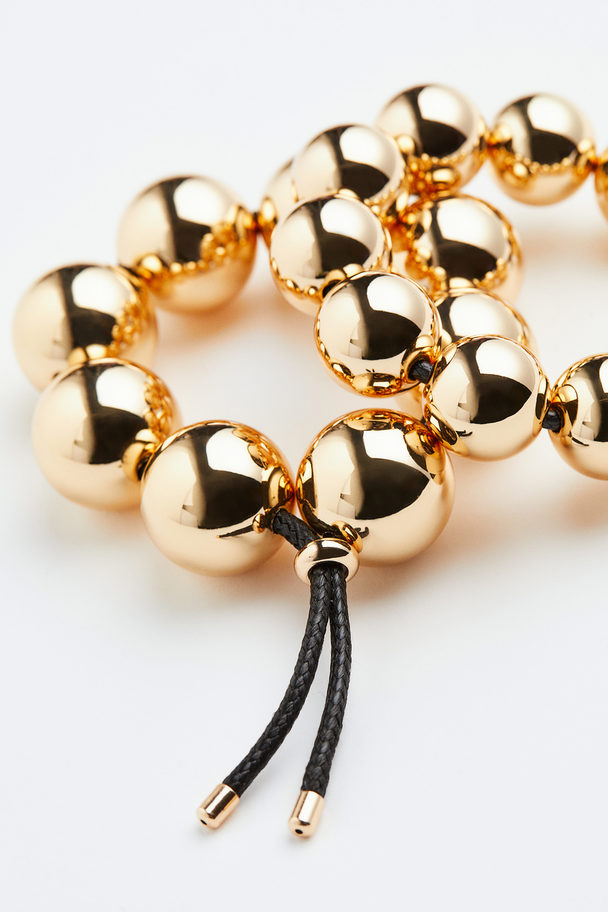 H&M 2er-Pack Armbänder mit Perlen