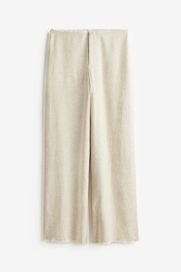 H&M Hose aus Leinenmix mit Fransenkante Hellbeige