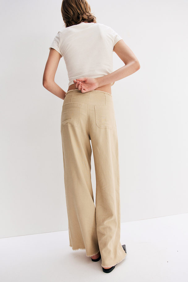 H&M Hose aus Leinenmix mit Fransenkante Beige