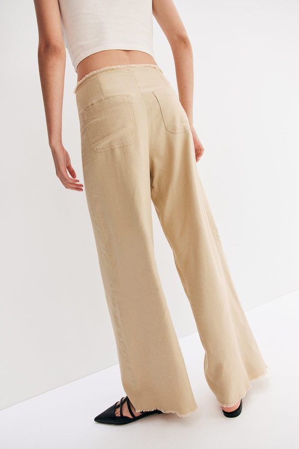 H&M Hose aus Leinenmix mit Fransenkante Beige