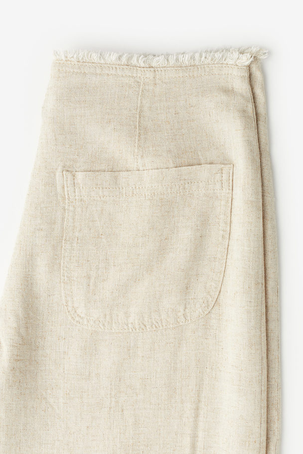 H&M Hose aus Leinenmix mit Fransenkante Hellbeige