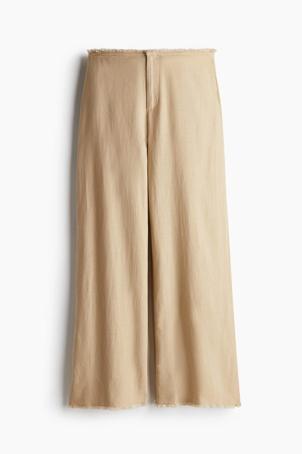 H&M Hose aus Leinenmix mit Fransenkante Beige