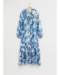 Weiches, feminines Kleid mit Rüschendetails Blau/Blumendruck