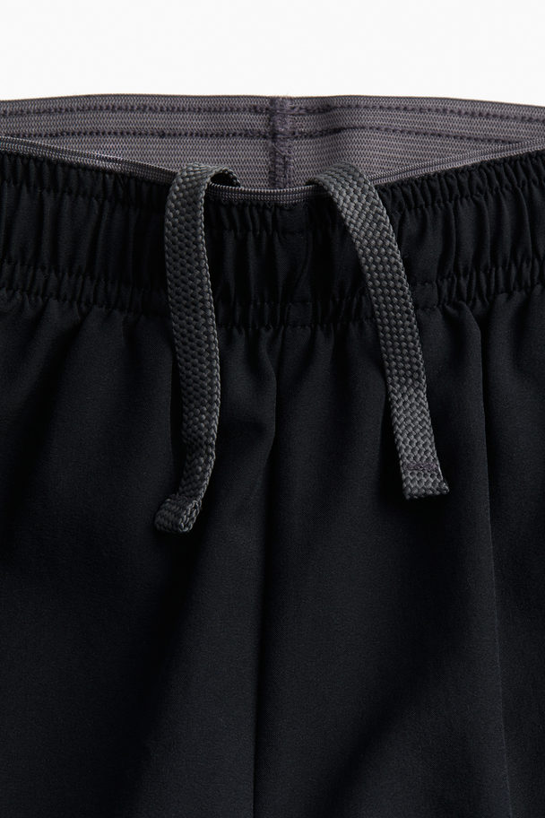 H&M DryMove™ Sportshorts Schwarz