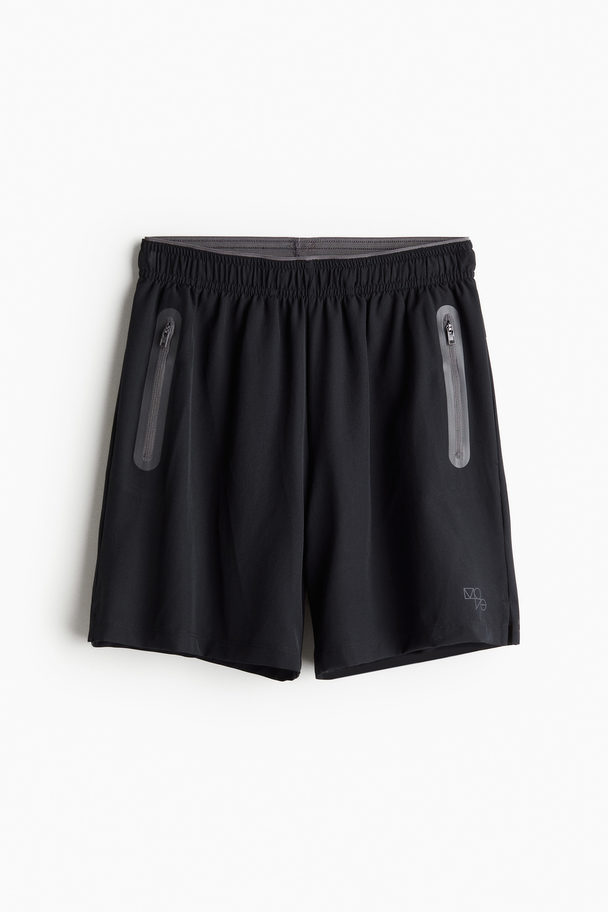 H&M DryMove™ Sportshorts Schwarz