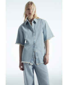 Kortärmad Jeansskjorta Med Fransade Kanter Ljusblå