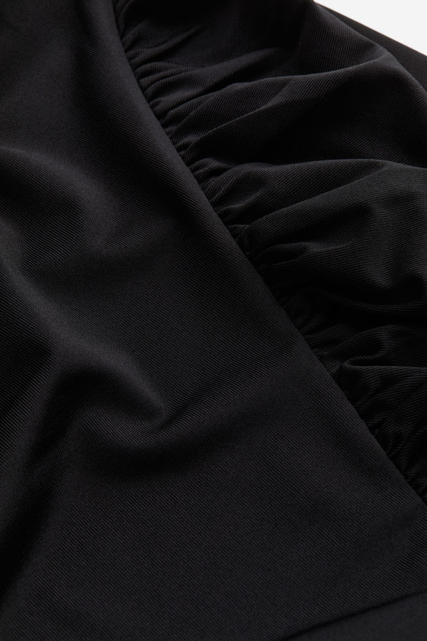 H&M Gedrapeerde One-shoulderjurk Zwart