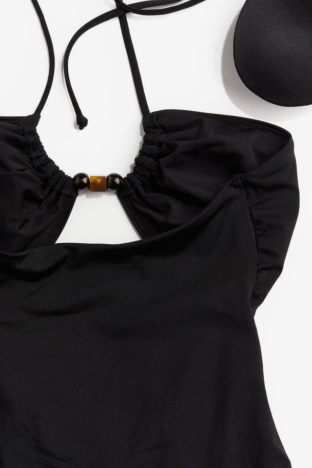 H&M Badeanzug mit Cut-outs und wattierten Cups Schwarz