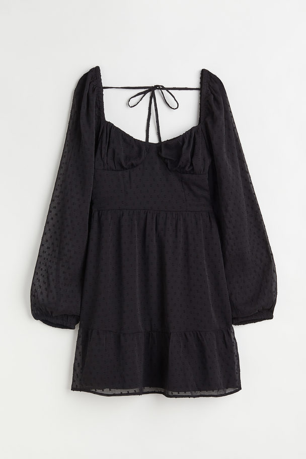 H&M Kleid aus Plumetis Schwarz