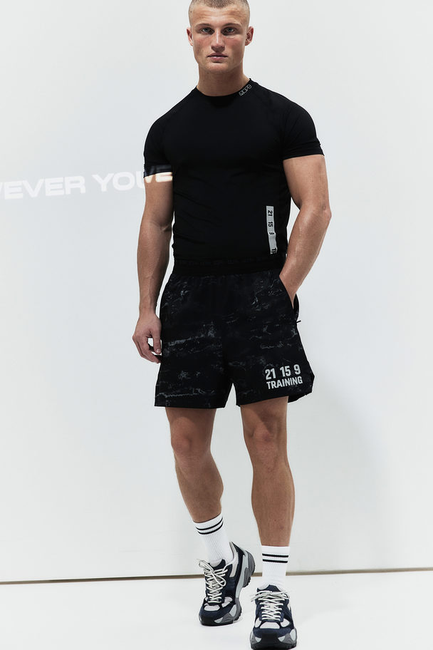 H&M Drymove™ Muscle Fit Trenings-t-shirt Sort/trening
