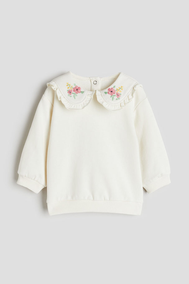 H&M Shirt mit Motivstickerei Cremefarben/Blumen