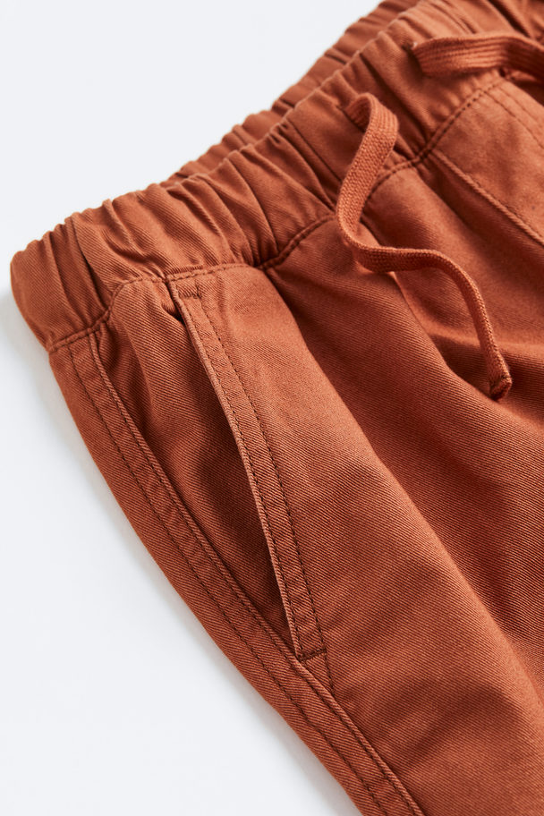 H&M Loose Fit Cotton Twill Joggers Brown