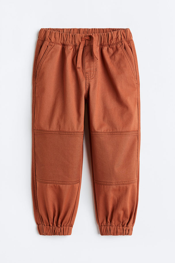 H&M Loose Fit Cotton Twill Joggers Brown
