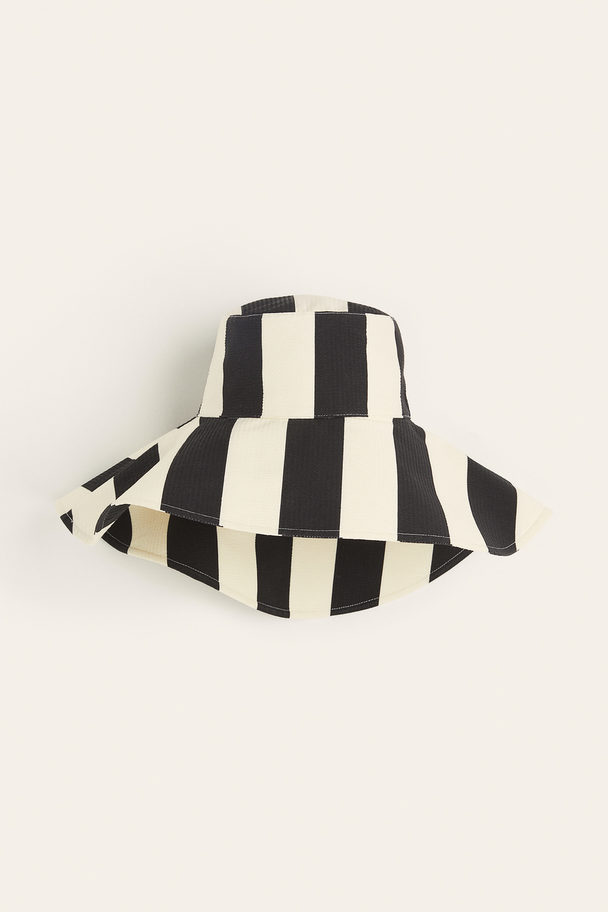 H&M Bucket Hat aus Seersucker Schwarz/Gestreift