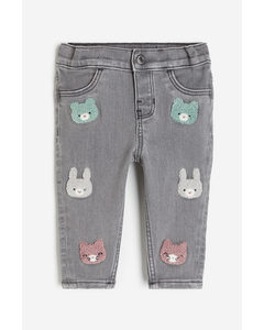 Bestickte Jeans Denimgrau/Tiere