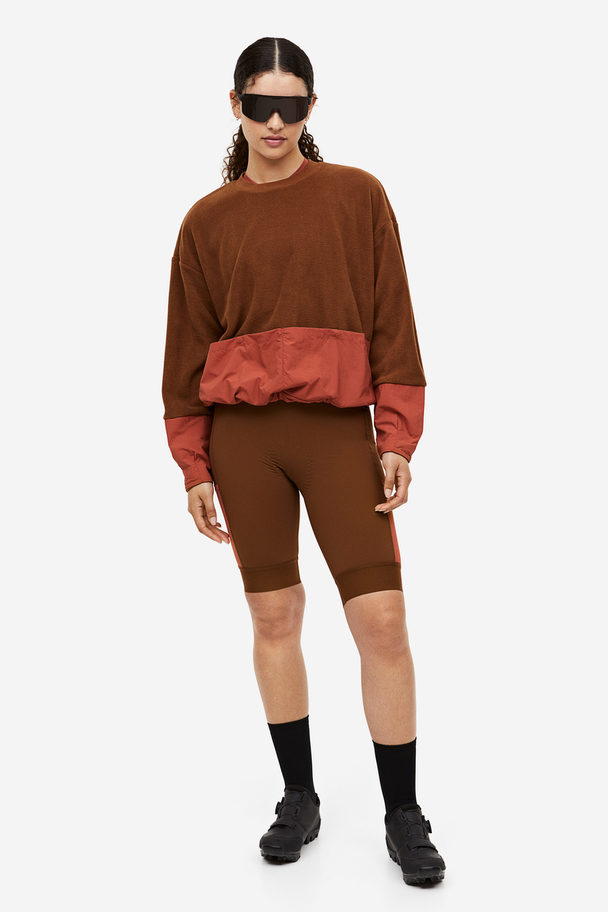 H&M Fleecepullover mit Taschendetails Braun/Colourblocking