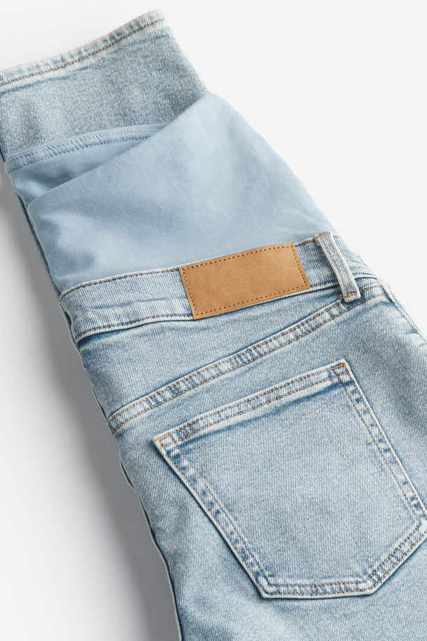 H&M MAMA Slim Ankle Jeans Helles Denimblau