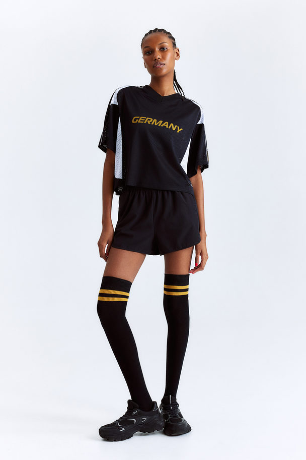 H&M DryMove™ Cropped Fußballtrikot Schwarz/Deutschland