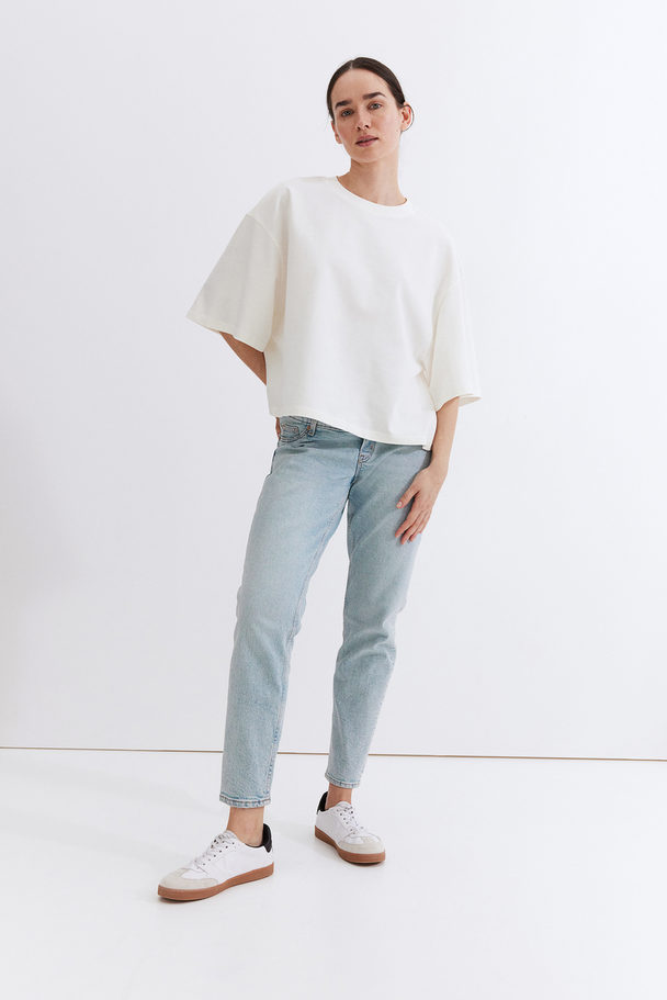 H&M MAMA Slim Ankle Jeans Helles Denimblau